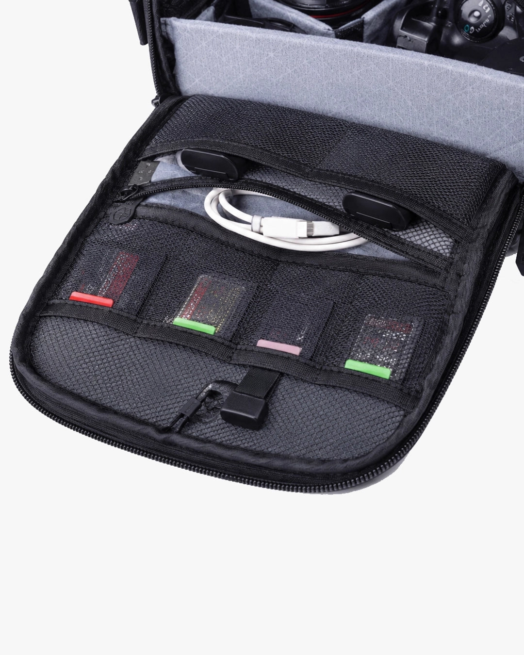 painel frontal mesh l-device cartões sd cabos bateria extra flash visível acessível imediatamente shoulder bag fotográfica organizada