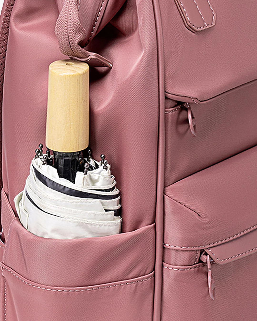 mochila zafira lateral rosa estrutura semi-rígida secureshape impermeável hydro shield anti-riscos mochila feminina durável qualidade premium acabamento refinado
